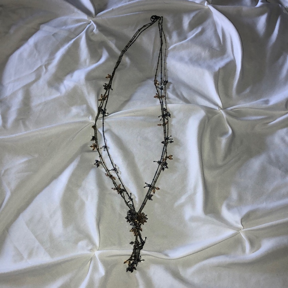 Three strand chain and beaded necklace.